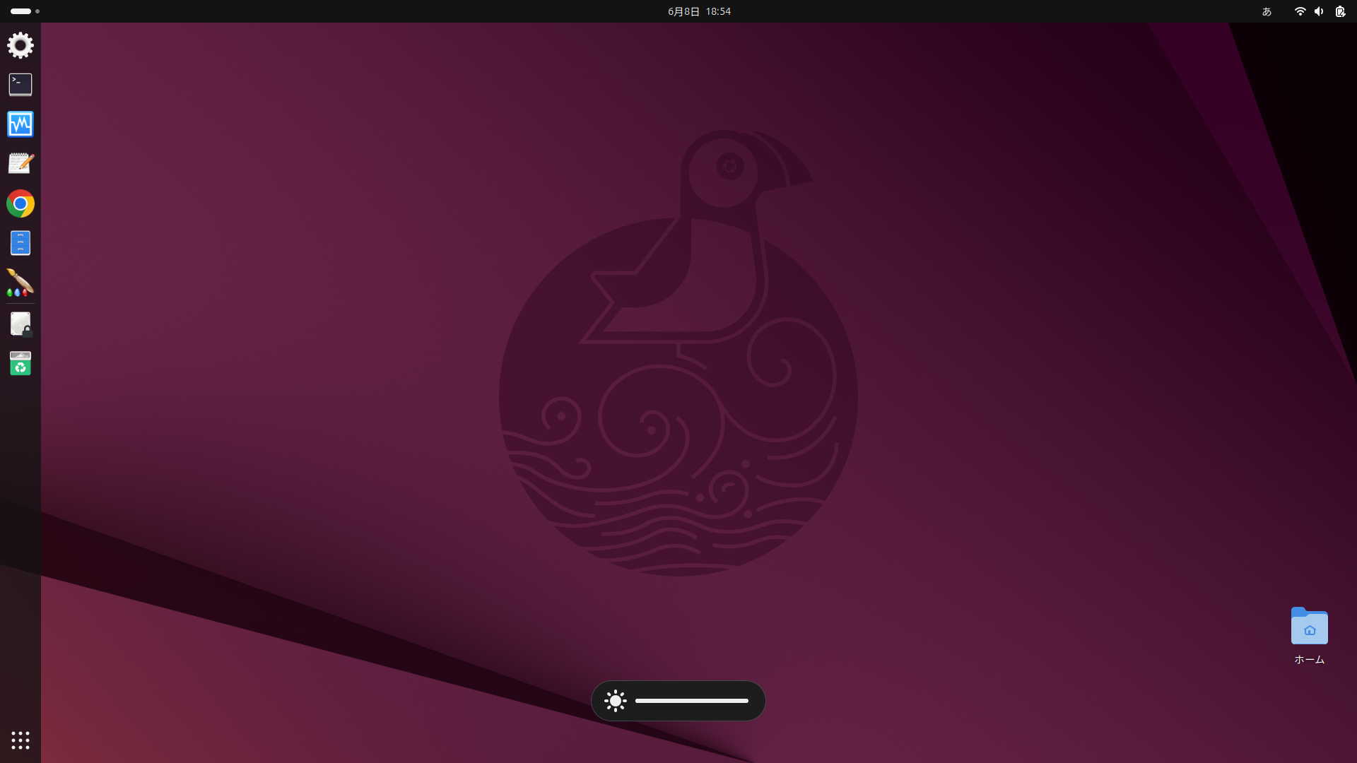 Ubuntu 25.04のデフォルト壁紙とアプリドックが表示されたデスクトップ画面